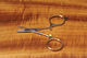 Preview image of product Dr Slick 4 Inch Gold Scissor Clamp